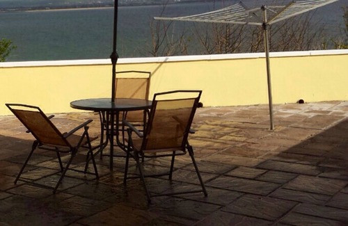 Ballycotton Cottage | 'Sea Haven', with its Amazing Sea View, perched on the cliff side.