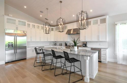 Anna Maria House | Sea La Vie Beach House - Luxurious 4BR Home W Pool Spa Dock Canal Access on Anna Maria Island