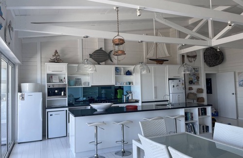 Waterhouse House | Sea views, located at Hooper's beach. Town center.
