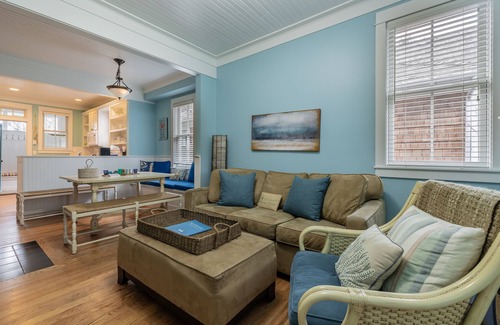 Seabrook House | Seabrook's Cape Escape a cozy 2-bedroom home with a covered porch!