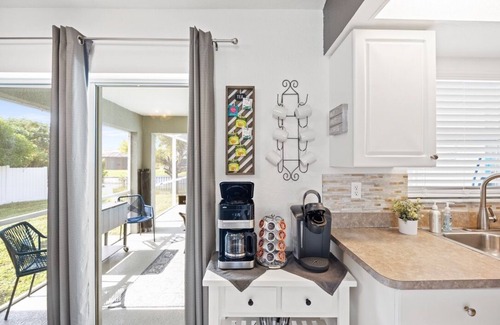 Trafalgar House | Seas the Day! Heated Pool Home on Canal 4 bedroom/2 Bath