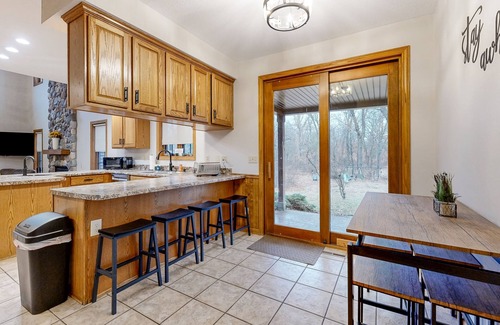 New Lisbon House | Secluded exclusive brick home with game room, fireplaces, large porch, firepit