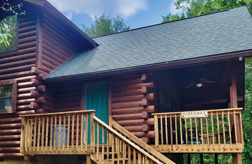 Eureka Springs Cabin | Secluded Hideaway Cabin boasting Wrap-Around Deck and Jacuzzi for two! Trail & Cave on property!
