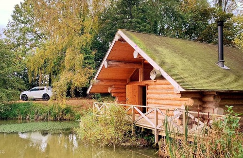 Bridport Cabin | Secluded Log Cabin/Hot Tub On Private Laken1km to Jurassic Coast Pet friendly.