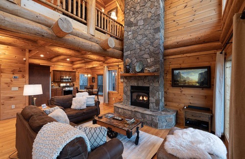 Almond Cabin | Secluded log cabin with fireplace and hot tub on deck.