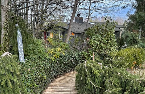 Fennville House | Secluded Mid Century Modern Hutchins Lake Property on 12 acres