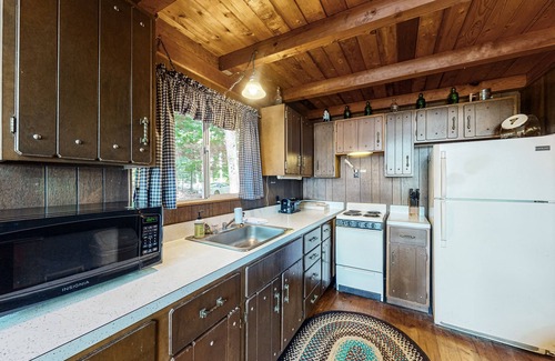 Parsonsfield House | Secluded waterfront cabin with private dock, kayak, canoe, gas grill & deck