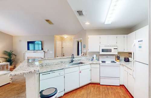 Gulf Shores Condo | Second floor condo with pool & hot tub access, WiFi, private W/D, and central AC