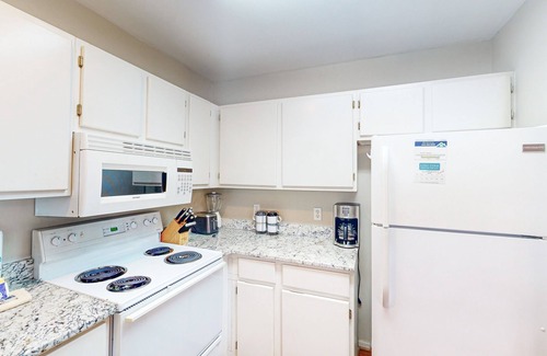 Gulf Shores Condo | Second floor condo with pool & hot tub access, WiFi, private W/D, and central AC