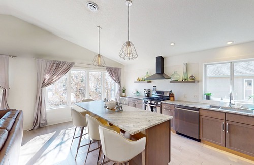Bottineau House | Second-floor downtown home with fireplace, streaming, washer/dryer, & AC