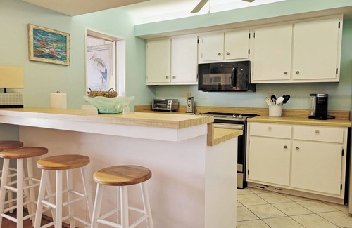 Pawleys Island Condo | Second Row Condo, Covered Parking, Creek Dock, 2 Pools, Easy Access to Beach