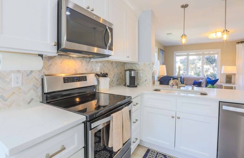 Isle of Palms Condo | See, Feel & Hear the Ocean from this Light-Filled Condo w/Community Pool & Private Screened Porch.
