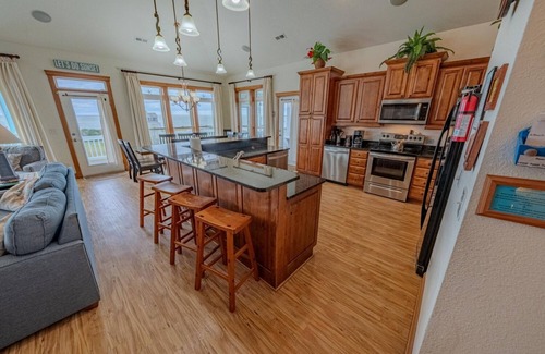 Wind Over Waves House | Semi-Soundfront: Pool, Hot Tub, Game Room, Elevator, Boat Ramp, Linens Included