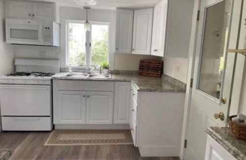 Ludington House | September dates now open! Cozy Beach Town Cottage Awaits.
