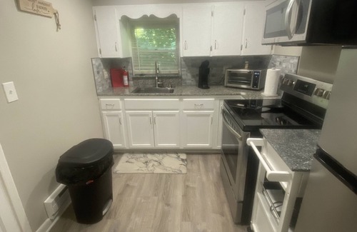 Mitchell House | Serene 2 bedroom home in residential neighborhood.