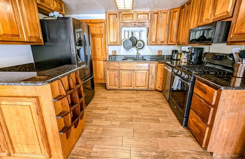 Gilford House | Serene estate with cottages, kitchens, pool, hot tub, fire tables, & views