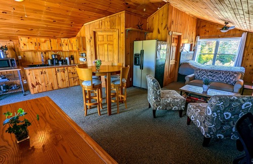 Gilford House | Serene estate with cottages, kitchens, pool, hot tub, fire tables, & views