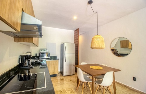 La Veleta Apartment | Serene, ground-floor getaway with private & shared pool, washer/dryer, & patio