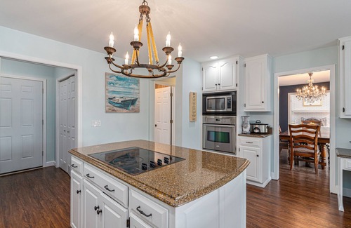 Berrien Springs House | Serene lakefront retreat with an expansive deck, dock access, game room, & AC