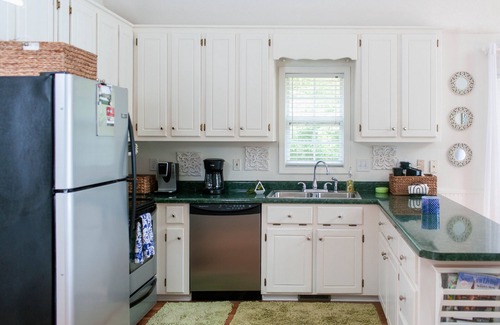 Eatonton House | Serene Lakefront Home with Private Dock, Hot Tub, Fire Pit and Boat!