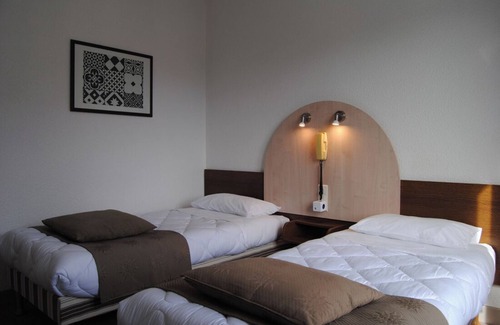 Lourdes Hotel | Serene & Spacious Unit with Balcony, Free Parking, Onsite Restaurant!