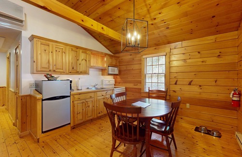 Northport Cabin | Serene two-bedroom dog-friendly cabin getaway with kitchen, fireplace & more