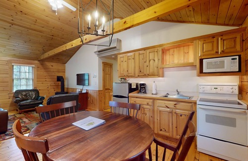 Northport Cabin | Serene two-bedroom dog-friendly cabin getaway with kitchen, fireplace & more