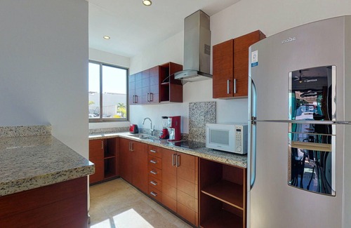 Zazil-ha Apartment | Serene vacation apartment with central AC, strong WiFi, & a shared rooftop pool