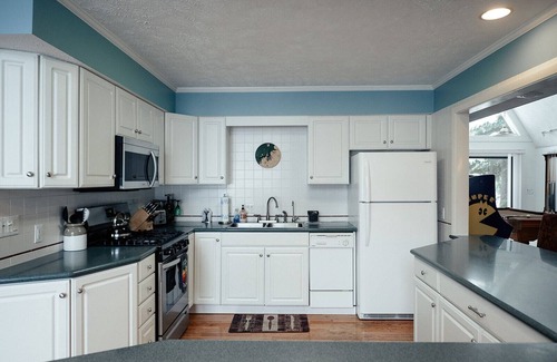 Williamsburg Ski Chalet | Serenity Shores on Lake Skegemog~ Boat, Ski & Sip!