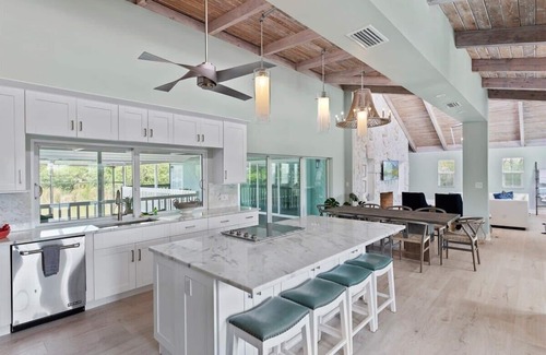 The Dunes House | Shellbound House Spectacular Lakefront Home With Pool in Dunes Golf Community