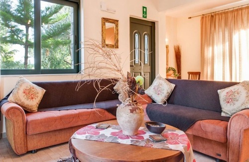 Exopoli Villa | Shiny villa Adriana into green nature overlooking Georgioupolis bay.