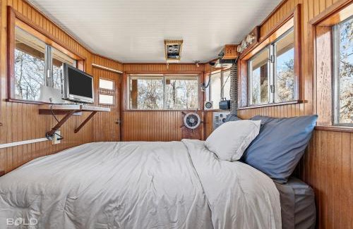 Uncertain House | Ship With Upper Deck & Kayaks & Canoes