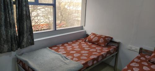 Vadodara Bed & Breakfast | Shiv Sai Dormitory