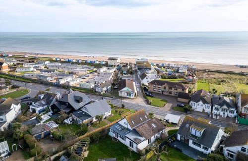Lancing House | Shoreline Hideaway By The Butler Collection