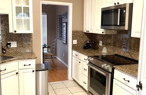Longtown House | Shoreline Lakefront Home with Boat Slip, Fire Pit and Golf Cart