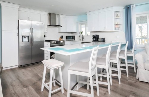 Hampton Condo | Short stroll to the beach! Newly renovated, 3 bedroom condo, wrap around porch