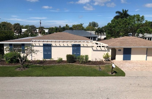 Whitney Beach House | Short walk to beach or take your boat from the canal /dock in your backyard!