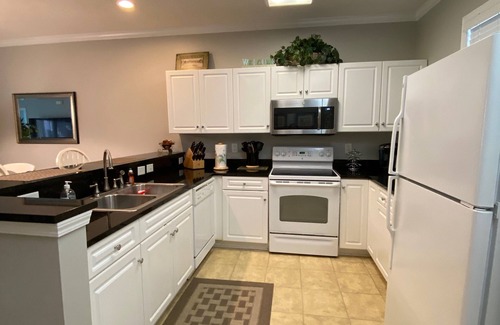 North Myrtle Beach Condo | Short Walk To The Beach,Sleeps 7, 1st Floor,Golf Cart,Crib,HighChair,BeachChairs