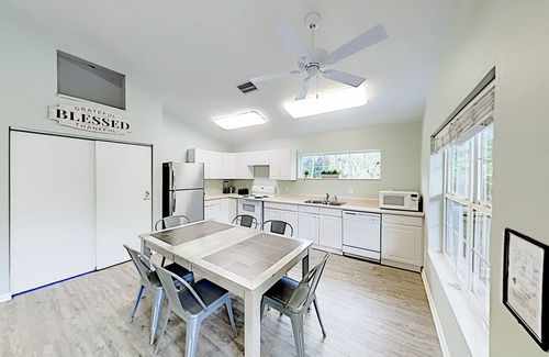 Tarpon Springs House | Side-by-side duplexes with 2 private pools, patios, grills, central AC & WiFi