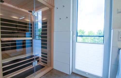 Fedderwardersiel Apartment | Sielhuus 11 Ferienwohnung mit Dachterrasse und Infrarotsauna und Kamin für bis zu 4 Personen in Fedderwardersiel!