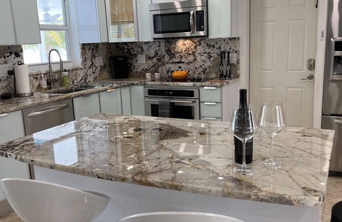 Singer Island House | Singer Island Private Home with Heated Pool, Enjoy Walks to the Beach