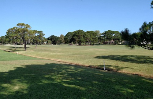 Fruitville House | Single family home on golf course with enclosed pool