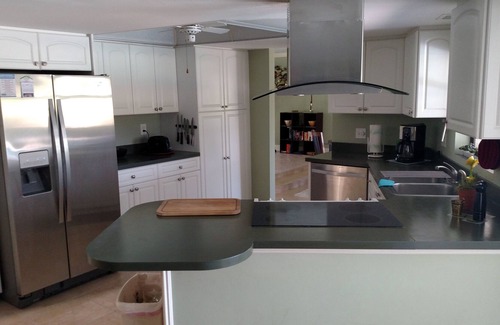 Fruitville House | Single family home on golf course with enclosed pool