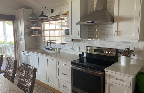 Indian Shores Cottage | Sixpence, Vintage Beachfront Experience