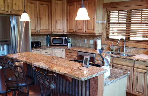Big Sky Cabin | Ski Heaven, Ski in, Ski out Big Sky Mtn Village Home with Hot Tub