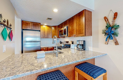 Ludlow Condo | Ski-in/out condo with mountain views, fireplace, pool, & hot tub