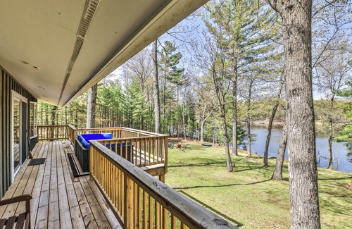 Arbor Vitae House | Skipping Stone on Towanda Lake