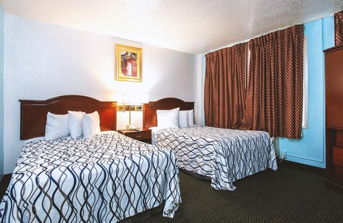 Wichita House | Sky-Palace Inn & Suites Wichita East - Comfort Suite 2 Queen Bed NS Oversized
