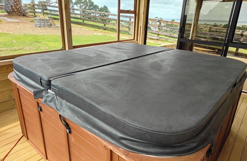 Awhitu Apartment | Sky tower and Water view over looking Paddock