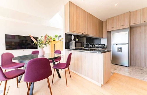 Roma Sur Condo | Skyline Retreat, Private Terrace, Gym Access